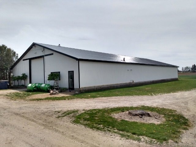 White Barn Black Steel Roof